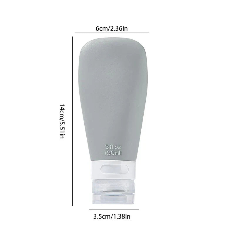 reisebehälter für toilettenartikel - Grauer Reisebehälter für Toilettenartikel, 90 ml/3 fl.oz, mit Angaben von 14 cm Höhe, 6 cm oberer Breite und 3,5 cm unterer Breite
