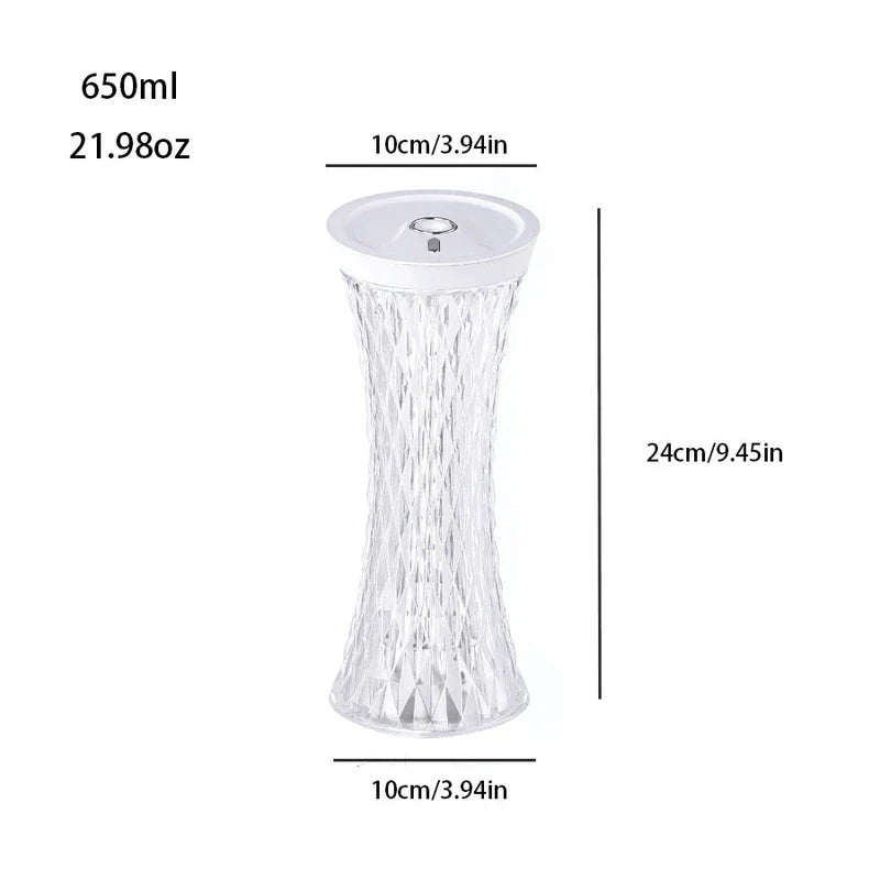 Cool mist diffuser with 650ml capacity, diamond-pattern clear body, height 24cm, top and bottom width 10cm, white lid, against white background.