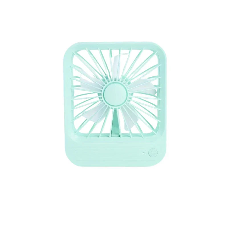 Small USB desktop quiet fan on a desk