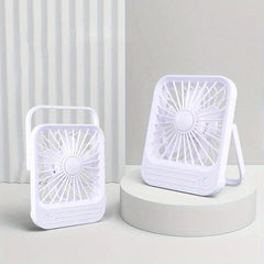 Desktop Quiet Fan - Two white desktop quiet fans, one on a circular display stand, against a curtain and light gray wall background
