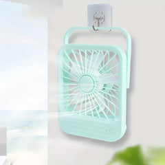 Small USB desk fan in a home office