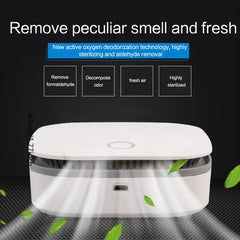 Air sanitizing machine with air flow and leaf graphics, text about odor removal on black background