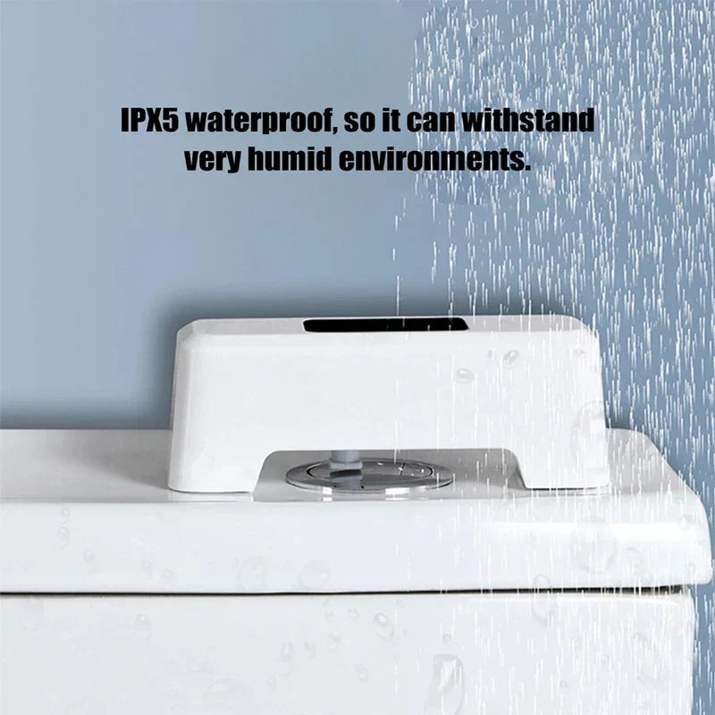 Smart toilet sensor on a toilet tank being sprayed with water, with text stating IPX5 waterproof for humid environments