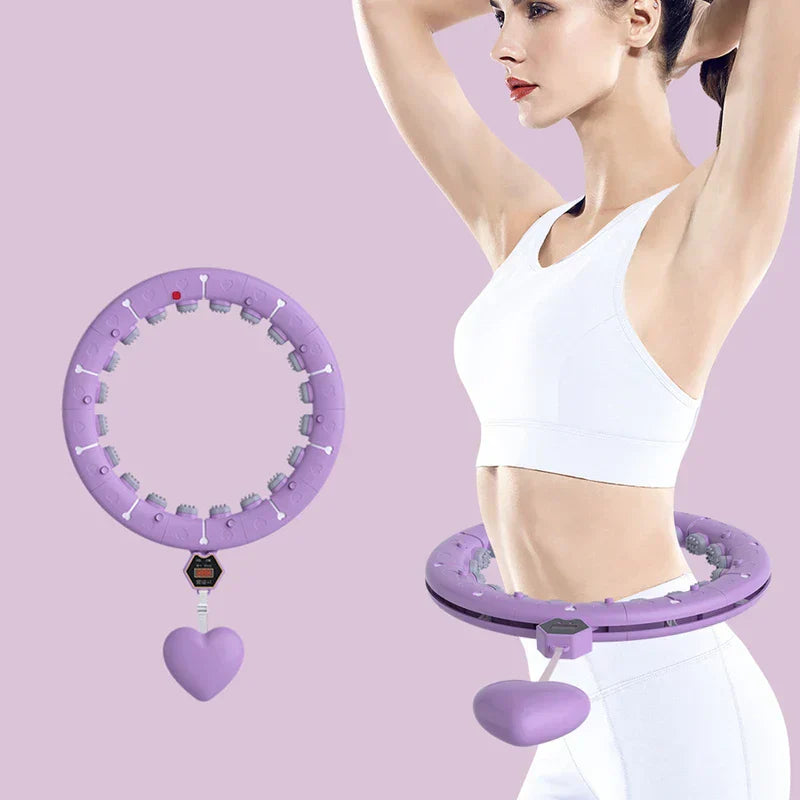 Woman using a weighted fitness hula hoop at home