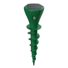 Solar ultrasonic snake rodent repeller spike installed in a garden