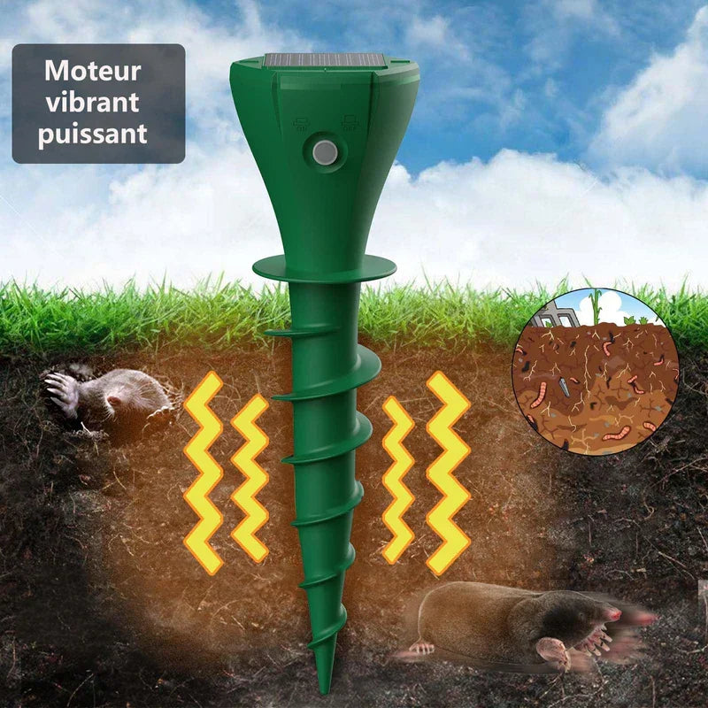 Solar ultrasonic snake rodent repeller spike in a lawn setting
