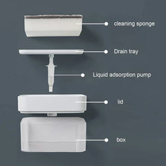 Soap dispensing cleaning brush in use while washing a plate