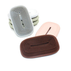 Dish Scrubber Brush - Stacked and flat oval silicone brushes showing bristle sides, in brown, pink, white, and light green.