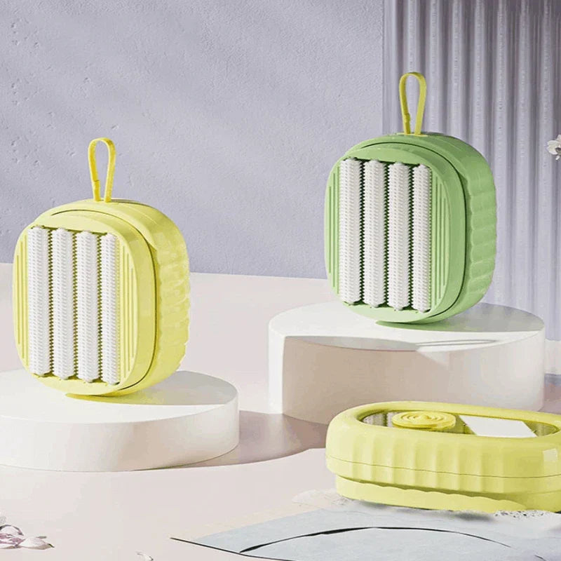 Laundry scrub brush with ergonomic handle and soap dispensing feature
