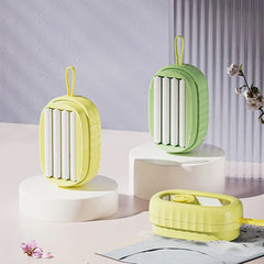Close-up of soap dispensing laundry scrub brush bristles and reservoir