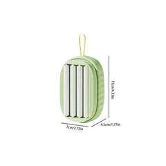 Laundry Scrub Brush - Green oval soap dispenser with hanging loop, showing internal textured rollers, with dimension labels