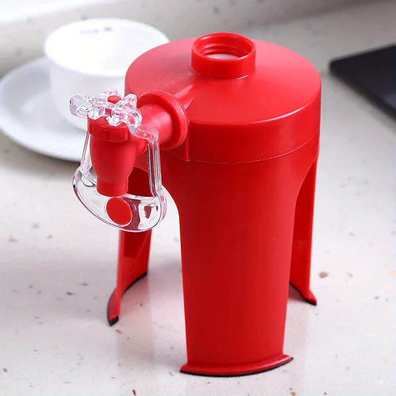 Soda drink dispenser fizz saver tap attached to a plastic soda bottle