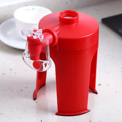 Soda drink dispenser fizz saver tap attached to a plastic soda bottle