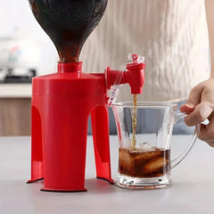 Close-up of the soda drink dispenser fizz saver tap pouring into a glass