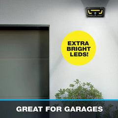Torch Light - Solar motion light mounted on exterior wall above garage door, with text reading extra bright LEDs and great for garages.