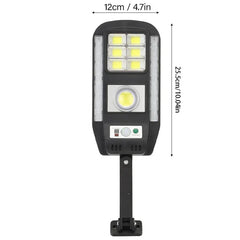 Front view of a solar powered security motion light fixture on a white background, with 12cm width and 25.5cm length dimension labels.