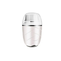 White egg-shaped handheld facial cleansing brush with brush head visible through clear top cap