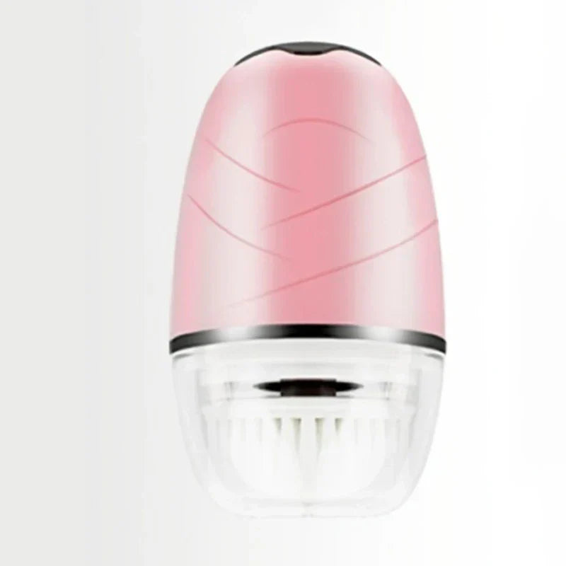 Pink egg-shaped handheld facial cleansing brush with transparent brush cover