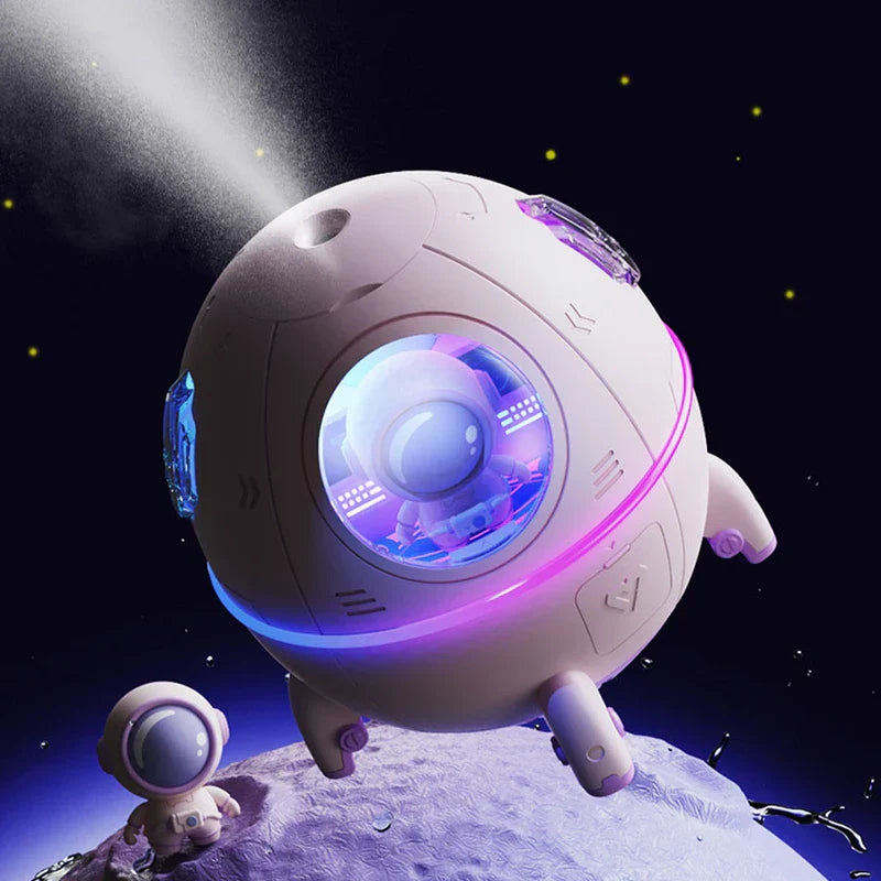 Humidifier Diffuser - Unit emitting fine mist against dark starry background, displayed with small astronaut figure on textured moon-like surface