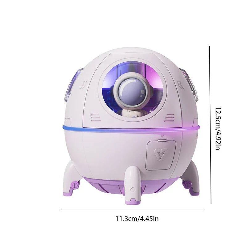 Humidifier Diffuser - Purple and white astronaut themed capsule shaped humidifier with lit purple interior light, dimensions labeled