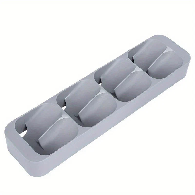 Spice Jar Organizer Box - Gray plastic four-tier slotted rack viewed horizontally from above at an angle