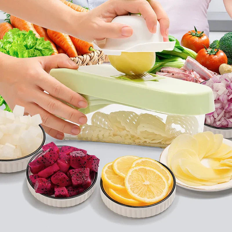 Hands using a light green slicer with a food guard to slice a yellow fruit, with cut produce bowls and fresh veggies in the background.