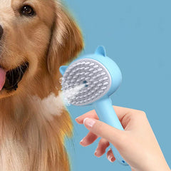 Beard Detangler Brush - Light blue pet grooming brush emitting mist, held near the neck of a golden retriever