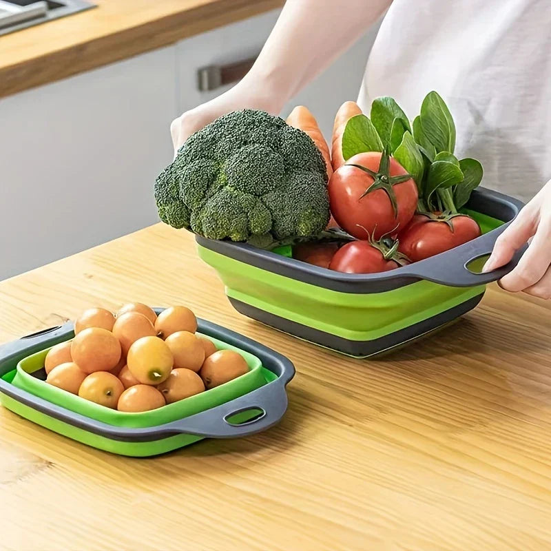 Square Plastic Colander Fruit Strainer Basket - Two green and gray collapsible strainers holding fresh produce on a wood countertop