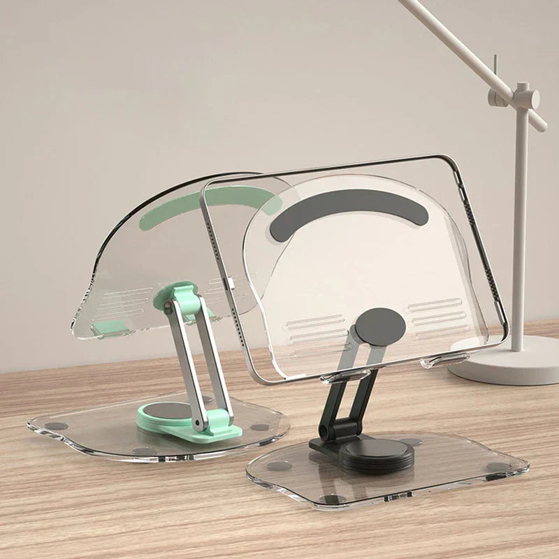Two foldable smartphone tablet desktop holders in mint and black on a wooden desk with a tablet and lamp