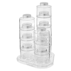 Spice Tower Jar Set - Stacked clear plastic spice tower set with three columns of tiered cylindrical containers on a clear curved base, each with a silver lid.