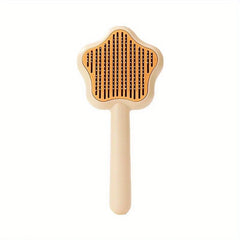 Peine de acero inoxidable para mascotas: cepillo de aseo en forma de pata con mango y marco beige, almohadilla de cerdas naranja con pines metálicos verticales