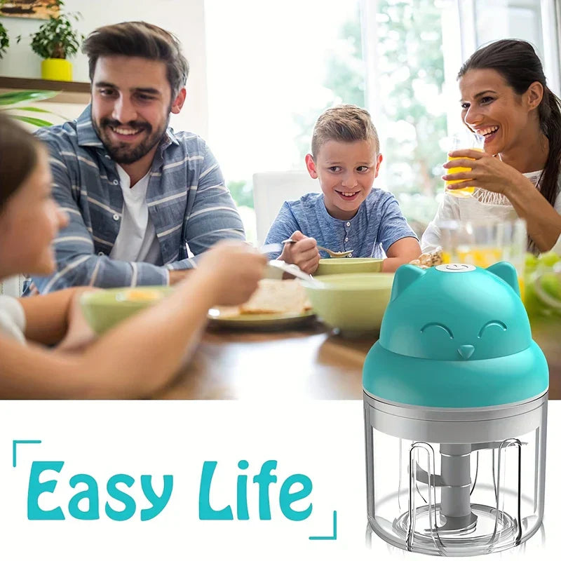 Family sits at dining table while a blue cat-shaped garlic press mincer sits in foreground with 'Easy Life' text