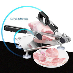 Mandoline Slicer - Manual slicer cutting raw meat with sliced pieces on a plate below