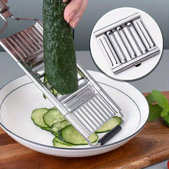Vegetable Cutter - Slicer being used to cut a cucumber into thin slices, inset shows the installed fine slicing blade