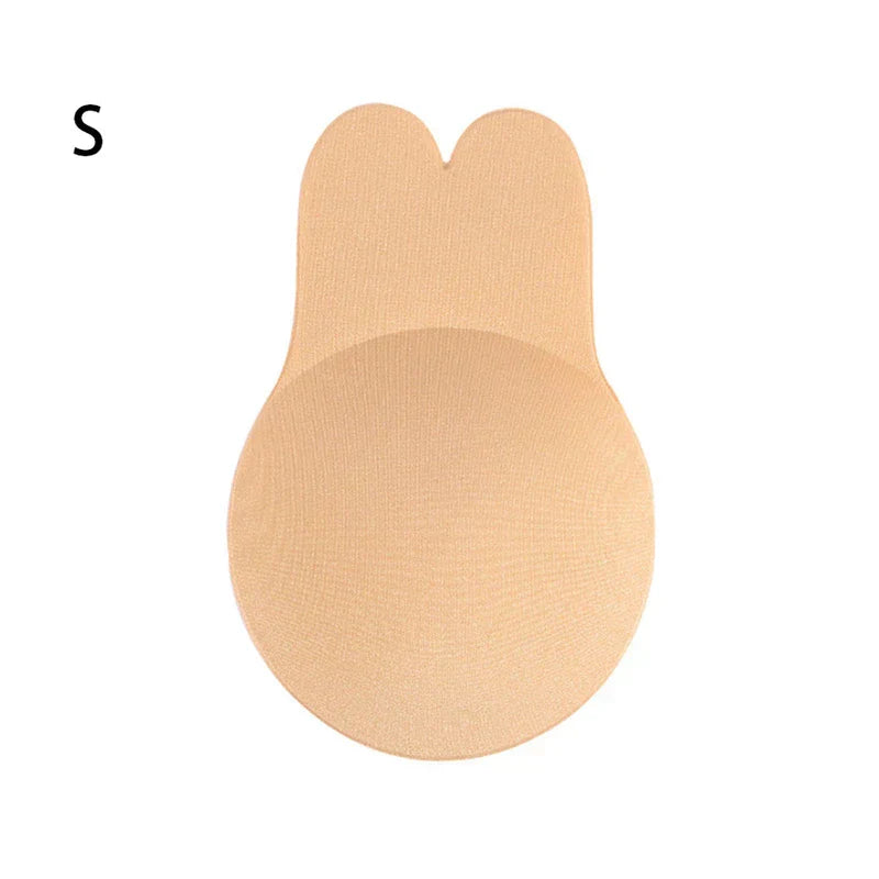 Nipple Concealers - Beige small size lift-style adhesive breast cover with notched top tab, displayed against plain white background