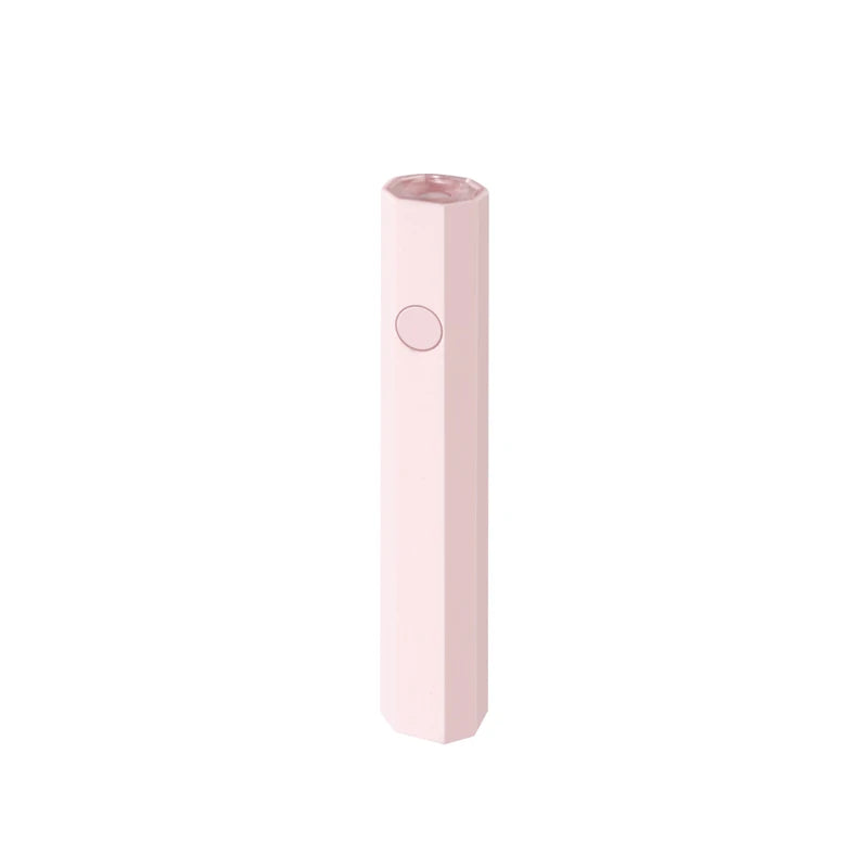 Pink hexagonal undercabinet led strip lighting unit with a round button, top view against white background