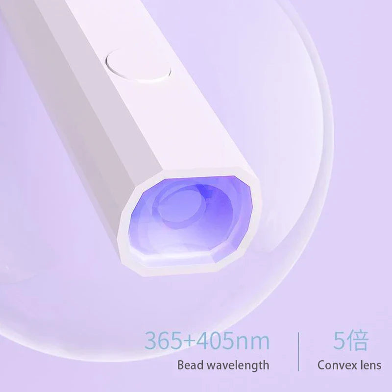 Close-up of white undercabinet led strip lighting head with purple light, text for 365+405nm wavelength and 5x convex lens