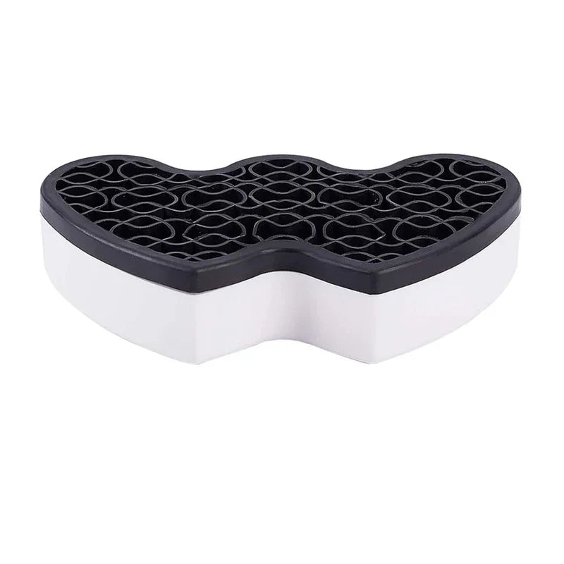 Storage Bin - Front angled view of two-tone heart-shaped organizer with black grid top and white base