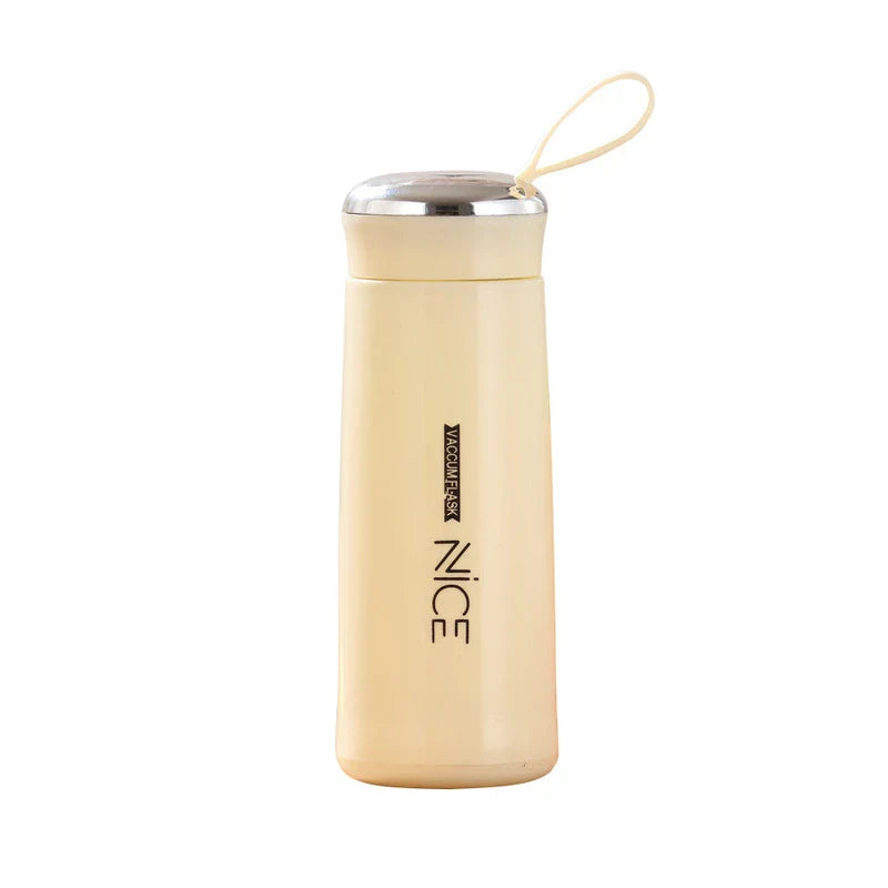 Cream colored plastic tumbler cup with a wrist strap, silver cap, and 'NICE' text, on a white background