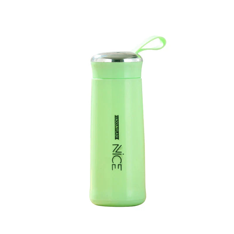 Light green plastic tumbler cup with silver-accented lid, carry loop, and vertical 'NICE' text branding