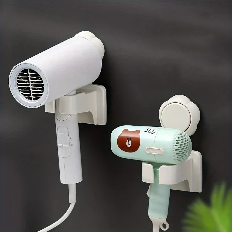 Hair Dryer Holder Wall Mount - Two installed holders on a dark smooth wall, each holding a standard hair dryer to demonstrate fit