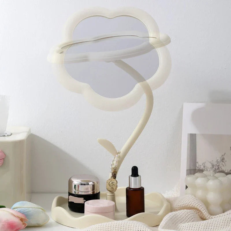 Close-up of sunflower frame on tabletop makeup mirror