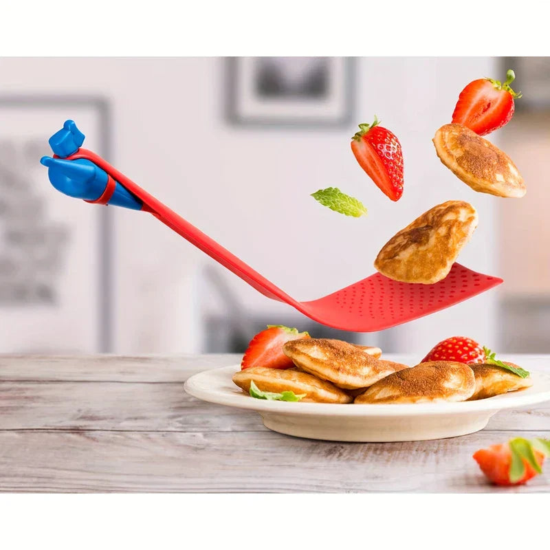 Turner Spatula - Superhero-themed spatula flipping mini pancakes above a white plate with fresh strawberries