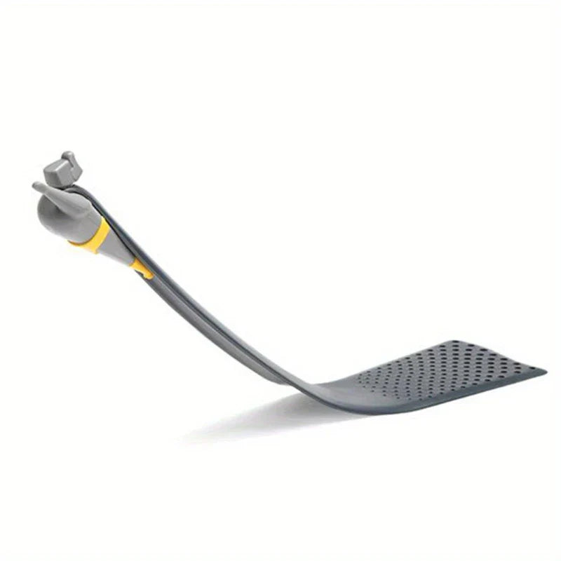 Turner Spatula - Gray flexible kitchen spatula with small squirrel-shaped handle end and perforated flat head