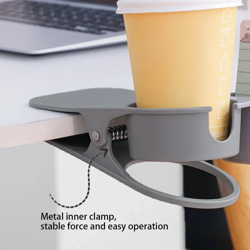 Table Side Drink Clamp Holder - Grey clip-on desk cup holder with a paper cup inside, clamped to a white desk edge
