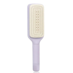 Front view of a light purple telescopic back scratcher with a smooth handle and beige bristle pad