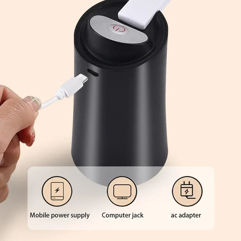 Electric Water Bottle Pump - Hand plugging a USB charging cable into the unit, showing supported charging sources