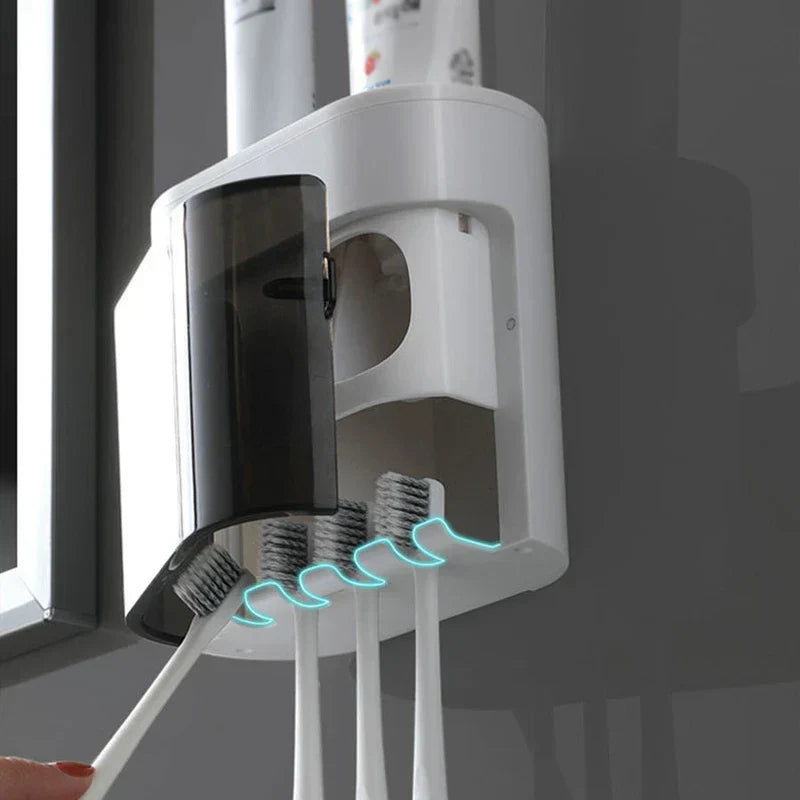 Hand using toothpaste dispenser squeezer dispenser tool