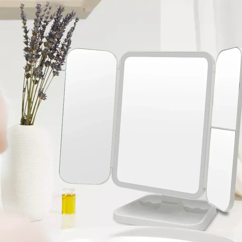 Tri-Fold LED makeup mirror mounted on a bathroom wall