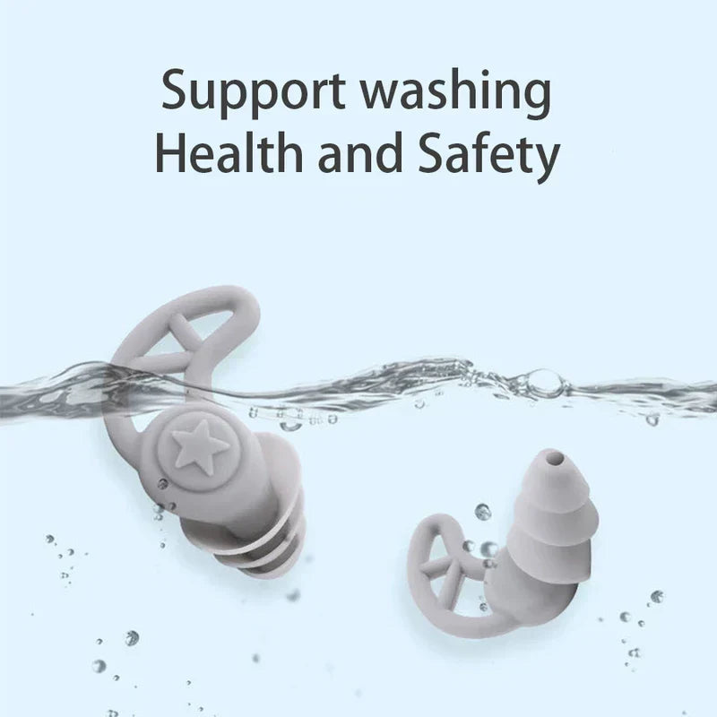 Noise Cancelling Ear Plugs - Two light grey silicone earplugs submerged half in clear water against light blue background, with text reading "Support washing Health and Safety"